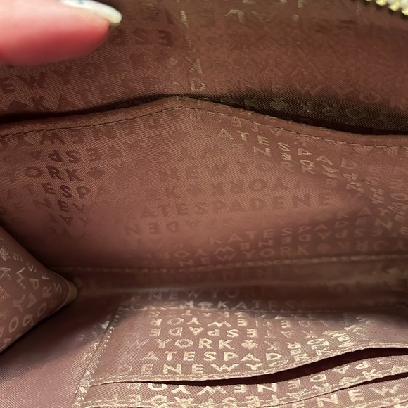 Kate Spade Wristlet in Pre Loved condition. It does have a bit of wear. - Picture 9 of 9